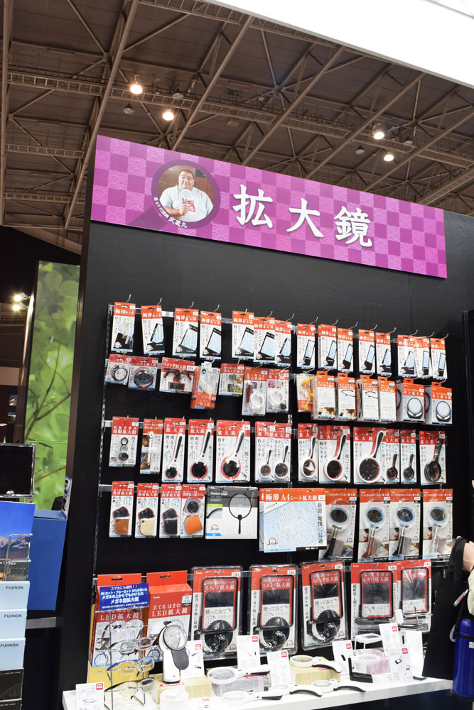An evergreen in Kenko Tokina booth is the corner dedicated to magnifying glasses and loupes.